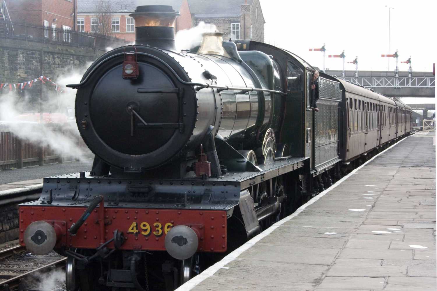 Steam train approaching Bury station